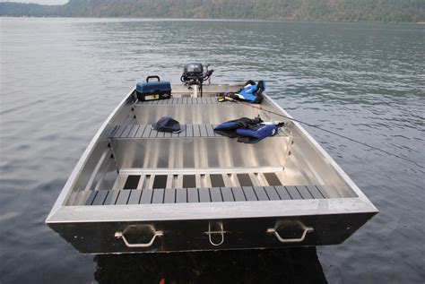 deck with storage compartment. . Extra wide jon boat for sale